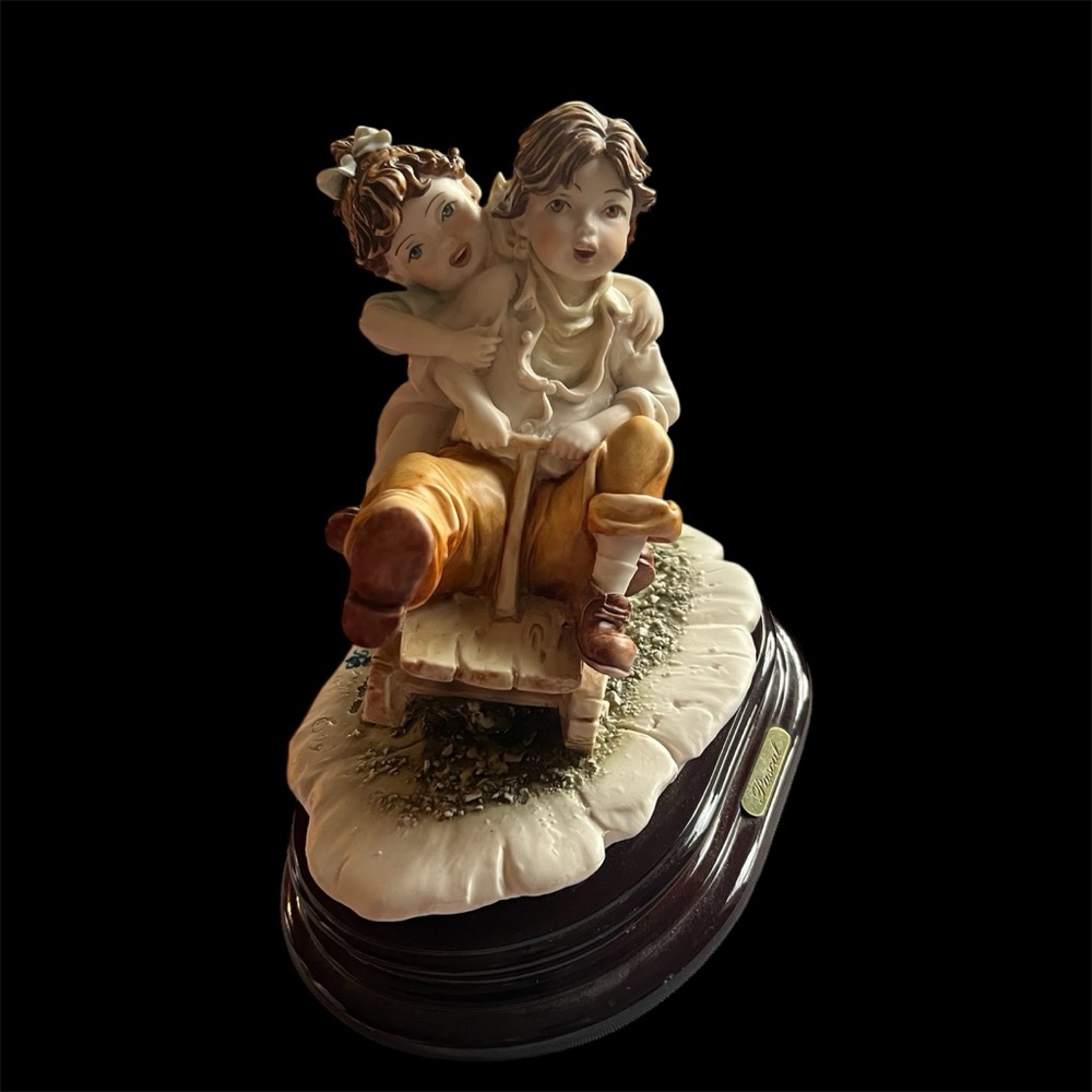 Charming Figurine of Children Playing